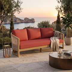 Anderson Teak Catania teak wood outdoor 3-seater patio sofa with natural canvas cushions, available in 9 designer colors.