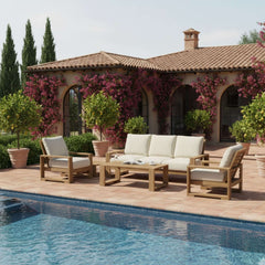 Anderson Teak Capistrano teak wood outdoor sofa set with natural canvas cushions, perfect for garden lounge and patio seating.