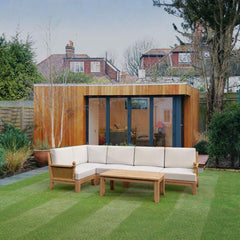 Anderson Teak Luxe Teak Wood Outdoor Patio Sectional Sofa with natural canvas cushions, available in 9 designer colors.