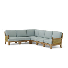 Anderson Teak Luxe Teak Wood Outdoor Patio Sectional Sofa in navy canvas, designed for garden lounge with 9 color options.