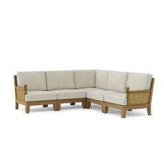 Anderson Teak SET-66 Luxe teak wood outdoor sectional sofa with deep seating, in a garden lounge setting with multiple designer color options.