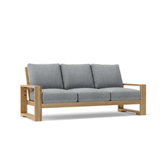 Anderson Teak Capistrano deep seating sofa in 9 designer colors, featuring plush cushions and modern outdoor furniture design.