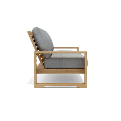 Anderson Teak Capistrano deep seating sofa in 9 designer colors, featuring plush cushions and teak frame for outdoor comfort.