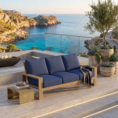 Anderson Teak Capistrano teak wood outdoor patio 3-seater sofa in cast mist color, designed for garden lounge and outdoor seating.