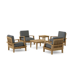 Anderson Teak Brianna teak wood outdoor seating set with 4 armchairs and 2 tables in a garden lounge setting