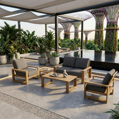 Anderson Teak Capistrano Teak Wood Outdoor Sofa Set with cushions, in a garden lounge setting, available in nine designer colors.
