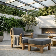 Anderson Teak Luxe Teak Wood Deep Seating Set with 1 armchair and ottoman in cast mist color for outdoor garden lounge.