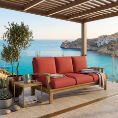 Anderson Teak Brianna teak wood outdoor 3-seater patio sofa in cast pomegranate with colorful cushions for garden lounge.