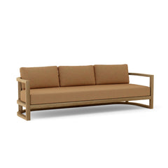 Anderson Teak Junus teak wood 4-seat outdoor patio sofa in pomegranate color, designed for garden lounge use.