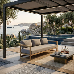 Anderson Teak Junus teak wood 4-seat outdoor patio sofa with plush cushions, available in 9 designer colors for garden lounge.