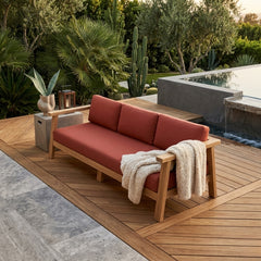 Anderson Teak Palermo teak wood outdoor 3-seater sofa with colorful cushions for garden lounge patio seating.