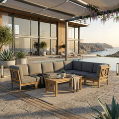 Outdoor teak wood sectional sofa set by Anderson Teak with colorful cushions, designed for garden lounge and patio relaxation.