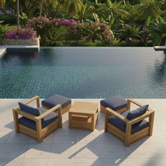 Anderson Teak Copacabana teak wood deep seating set with 2 armchairs and 2 ottomans in vibrant pomegranate color for outdoor patio lounging.