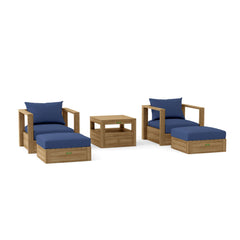 Anderson Teak Copacabana teak wood outdoor sofa set with 2 armchairs and 2 ottomans in vibrant pomegranate color.