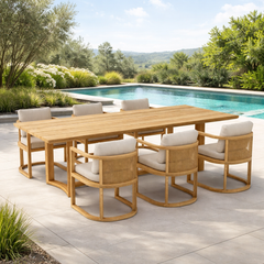 Anderson Teak JUNUS dining table set with 9 designer colors, featuring a stylish sofa and matching dining furniture in vibrant cast pomegranate.