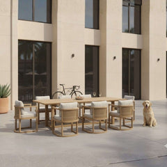 Anderson Teak JUNUS dining table set in cast pomegranate color, featuring a modern sofa with sleek design and vibrant finish.