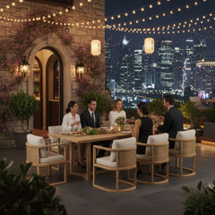 Anderson Teak Junus dining table set in cast pomegranate with nine designer color options, featuring a stylish sofa and table.