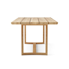 Anderson Teak JUNUS dining table set in pomegranate with 9 designer colors, featuring a stylish sofa and table arrangement.