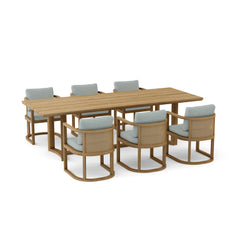 Anderson Teak Junus dining table set in pomegranate with 9 designer colors, shown with matching sofa and elegant outdoor furniture.