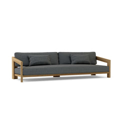 Anderson Teak Smyrna Teak Wood 4-seater outdoor patio sofa in Pomegranate with colorful cushions, garden lounge furniture.