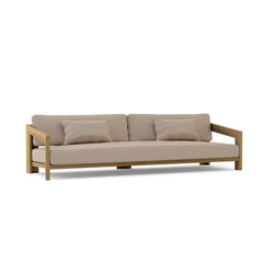 Anderson Teak Smyrna teak wood 4-seater outdoor patio sofa in pomegranate color, designed for garden lounge comfort.