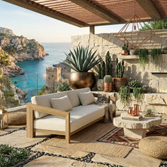 Anderson Teak Smyrna Teak Wood 4-Seater Outdoor Patio Sofa with colorful cushions, ideal for garden lounge spaces.