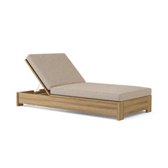 Anderson Teak Madera Sun Lounger in A-grade teak wood with a sleek design, available in 9 designer colors for outdoor patio relaxation.