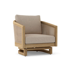 Anderson Teak Catania Swivel Chair in teak wood with colorful cushion, designed for outdoor patio and garden seating.