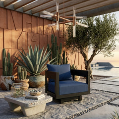 Anderson Teak Coronado aluminum swivel armchair in cast pomegranate, outdoor deep seating, available in 9 designer colors.