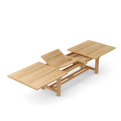 Anderson Teak Bahama 157-inch rectangular double extension table showing its extra thick wooden surface and sturdy design.