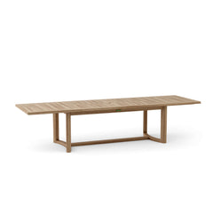 Catania extension table by Anderson Teak showing a spacious wooden dining table with extendable leaves and natural teak finish.