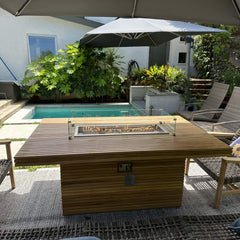 Anderson Teak Louvre rectangular outdoor teak fireplace table for patio, showcasing a sleek, modern design with a built-in fire feature.