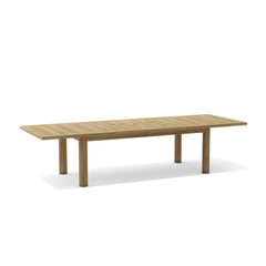 Rectangular Chelsea double extension teak table by Anderson Teak, showing smooth wood surface and extended sections for versatile dining.
