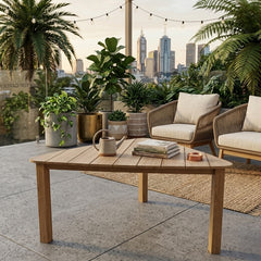 Padua Triangle Table by Anderson Teak, showcasing a stylish outdoor teak table with a modern triangular design and smooth finish.