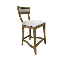 Carvell Cowhide bar stool by Zentique featuring a sturdy wooden frame and a stylish cowhide upholstered seat.