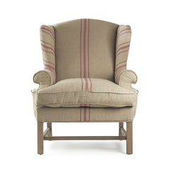 Fabien Wingback Accent Chair by Zentique featuring plush upholstery and elegant wooden legs in a stylish living room setting.