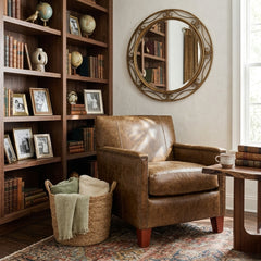 Larry Arm Chair wigwam style accent chair by Zentique with top grain leather upholstery and wooden legs.