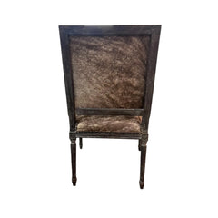 Louis Cowhide Accent Arm Chair by Zentique featuring a stylish cowhide upholstery and elegant wooden legs.