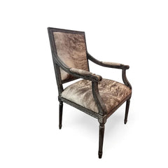 Louis Cowhide Accent Chair by Zentique featuring a stylish armchair design with cowhide upholstery and wooden legs.