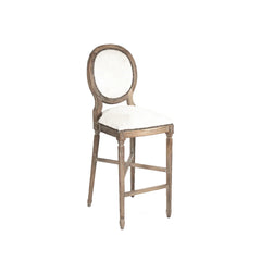 Zentique medallion cowhide accent bar stool with a wooden frame, featuring a distinctive cowhide pattern and comfortable seating.