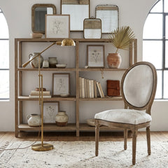 Zentique Medallion Cow Hide Bar Stool with wooden legs, accent chair design, featuring a distinctive cowhide medallion pattern.