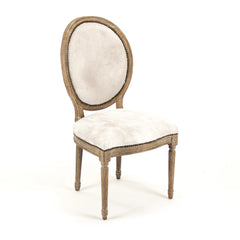 Zentique cowhide accent chair with medallion pattern, featuring a stylish and comfortable design for living room decor.
