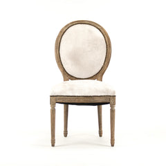 Zentique medallion cowhide accent chair with unique cowhide upholstery and wooden legs, stylish and comfortable for living spaces.