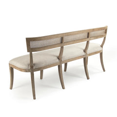 Carvell Cane Back Bench by Zentique featuring a wooden frame and woven cane backrest, ideal for indoor or outdoor seating.
