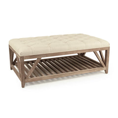 Matthis tufted ottoman by Zentique featuring a plush fabric top and wooden legs, perfect as a footstool or accent piece.