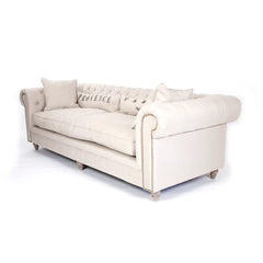 Alaine sofa by Zentique featuring elegant upholstery, plush cushions, and a stylish wooden frame in a modern living room setting.