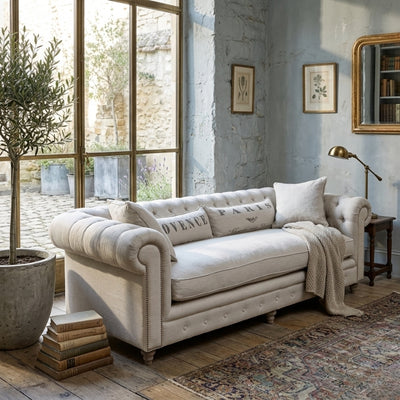 Alaine sofa by Zentique featuring plush fabric upholstery and elegant design, showcased in a stylish living room setting.