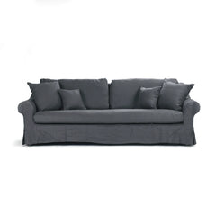 Albine sofa by Zentique featuring plush upholstery, elegant design, and sturdy wooden legs displayed in a stylish living room setting.