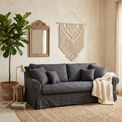 Albine sofa by Zentique featuring plush upholstery, wooden legs, and elegant design, ideal for living room decor.