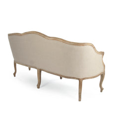 Benton sofa by Zentique featuring plush fabric upholstery and elegant wooden legs, perfect for a stylish living room.